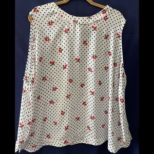 Sleeveless polka dot summer blouse